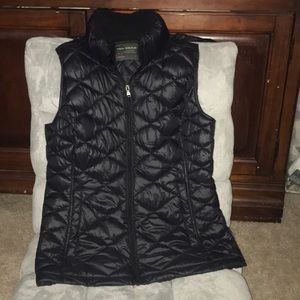 Black Puffer vest with hood.